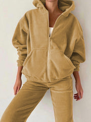 Tan fleece zip-up hoodie with front pocket and matching jogger pants.