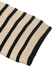 Nautical stripe sweater in beige and black acrylic with button shoulder detail.