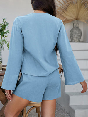 Light blue linen tie-front top and shorts set with bell sleeves.