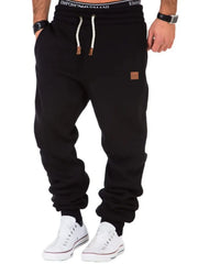 Black relaxed fit joggers with drawstring and leather details