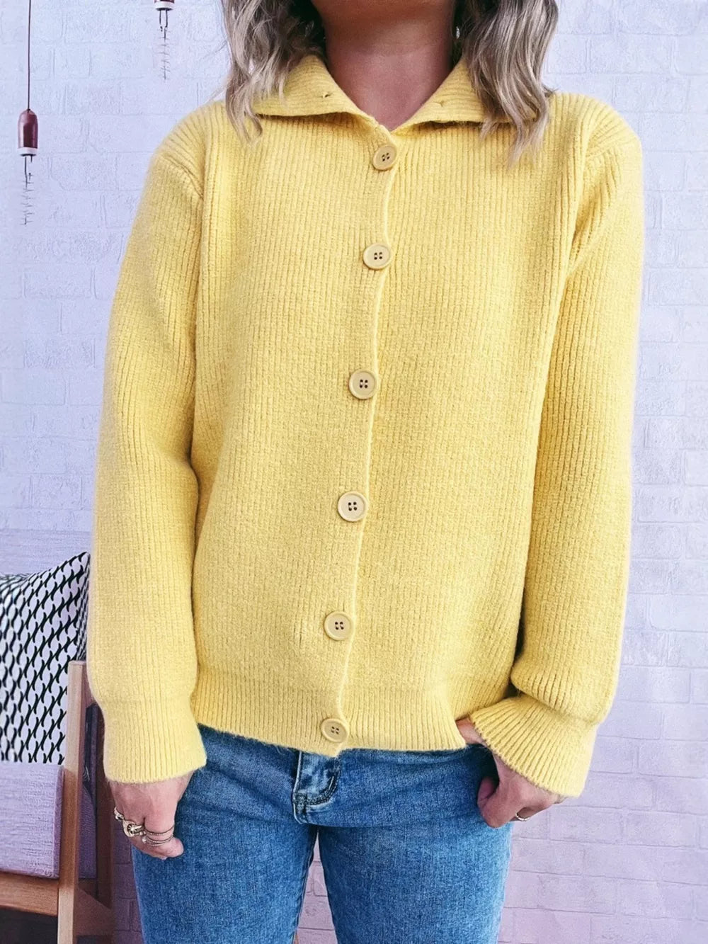 Yellow ribbed button-up cardigan with polo collar and wooden buttons