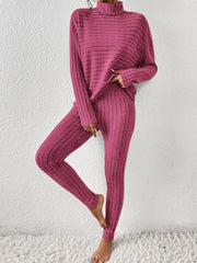 Textured turtleneck lounge set in hot pink with ribbed detail.