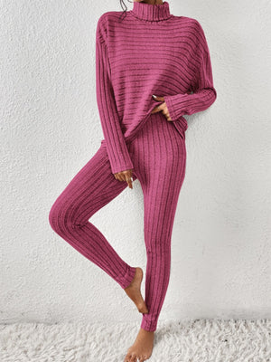 Textured turtleneck lounge set in hot pink with ribbed detail.