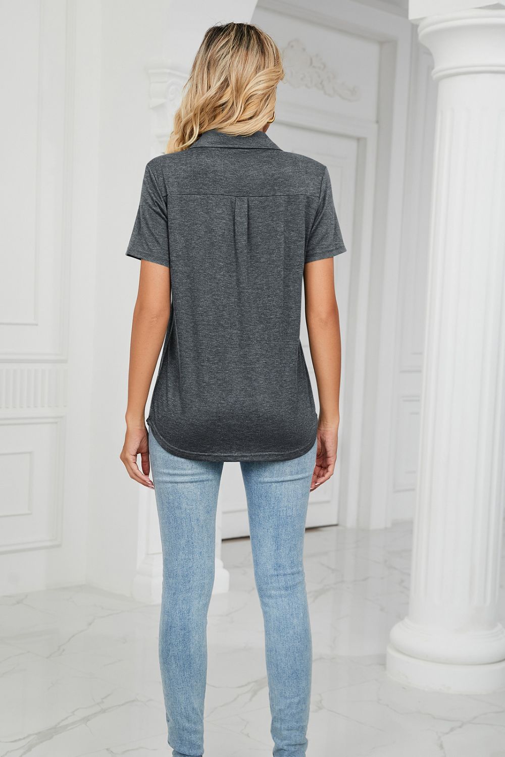 Dark Gray V-neck polo shirt with short sleeves and a back pleat detail.