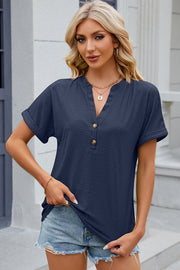 Dark blue textured henley tee with rolled sleeves and button detail