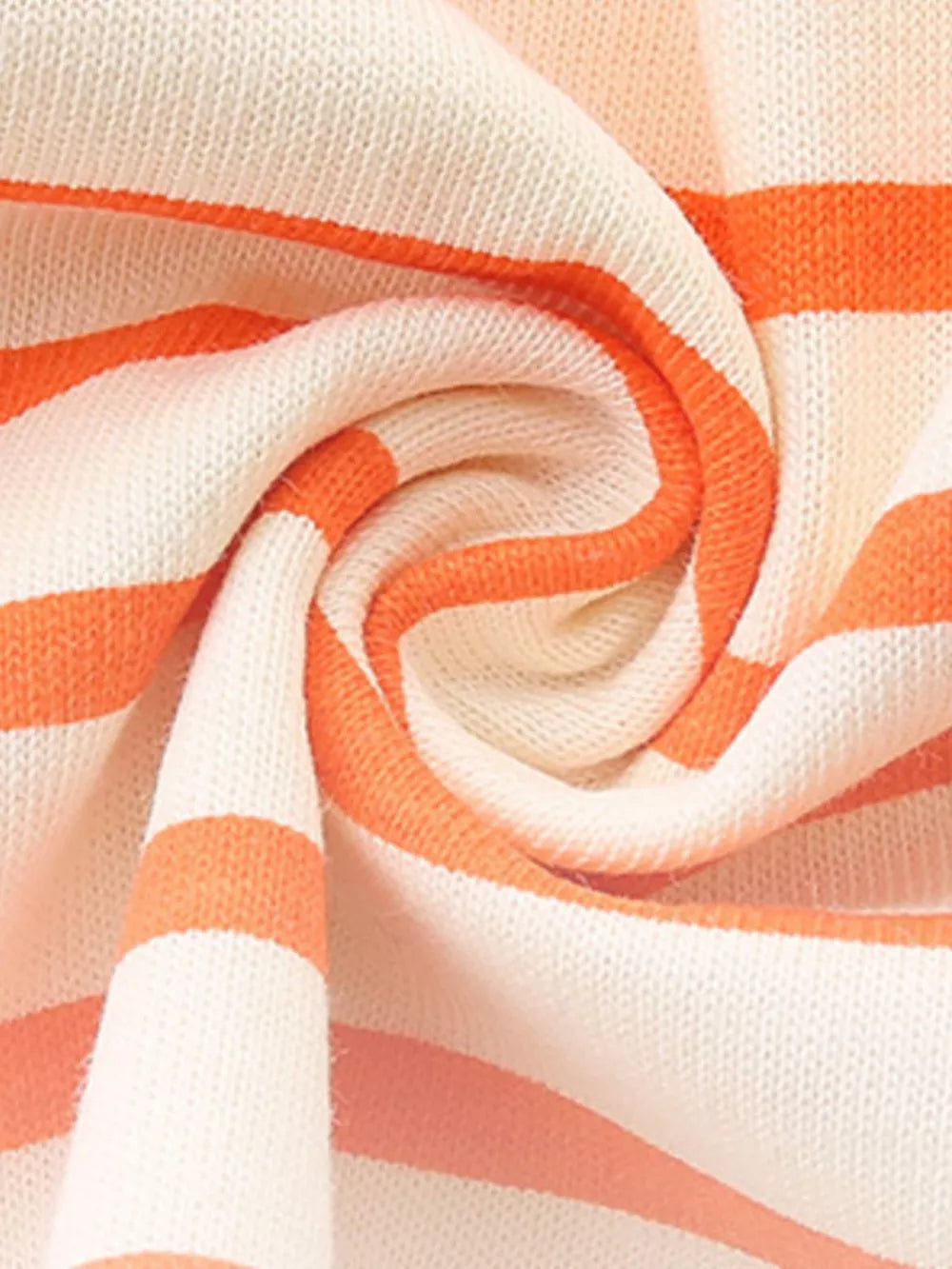 Toddler striped cotton dress in cream and orange with ruffled details.