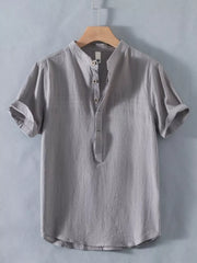 Grey cotton short sleeve shirt with band collar and button detail