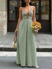 Green striped halter neck maxi dress with plunging neckline and tie detail.