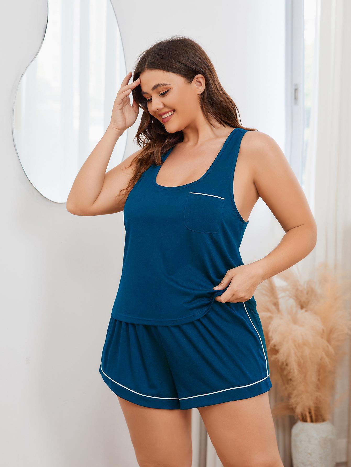 Peacock blue loungewear set with contrast trim racerback tank and shorts.