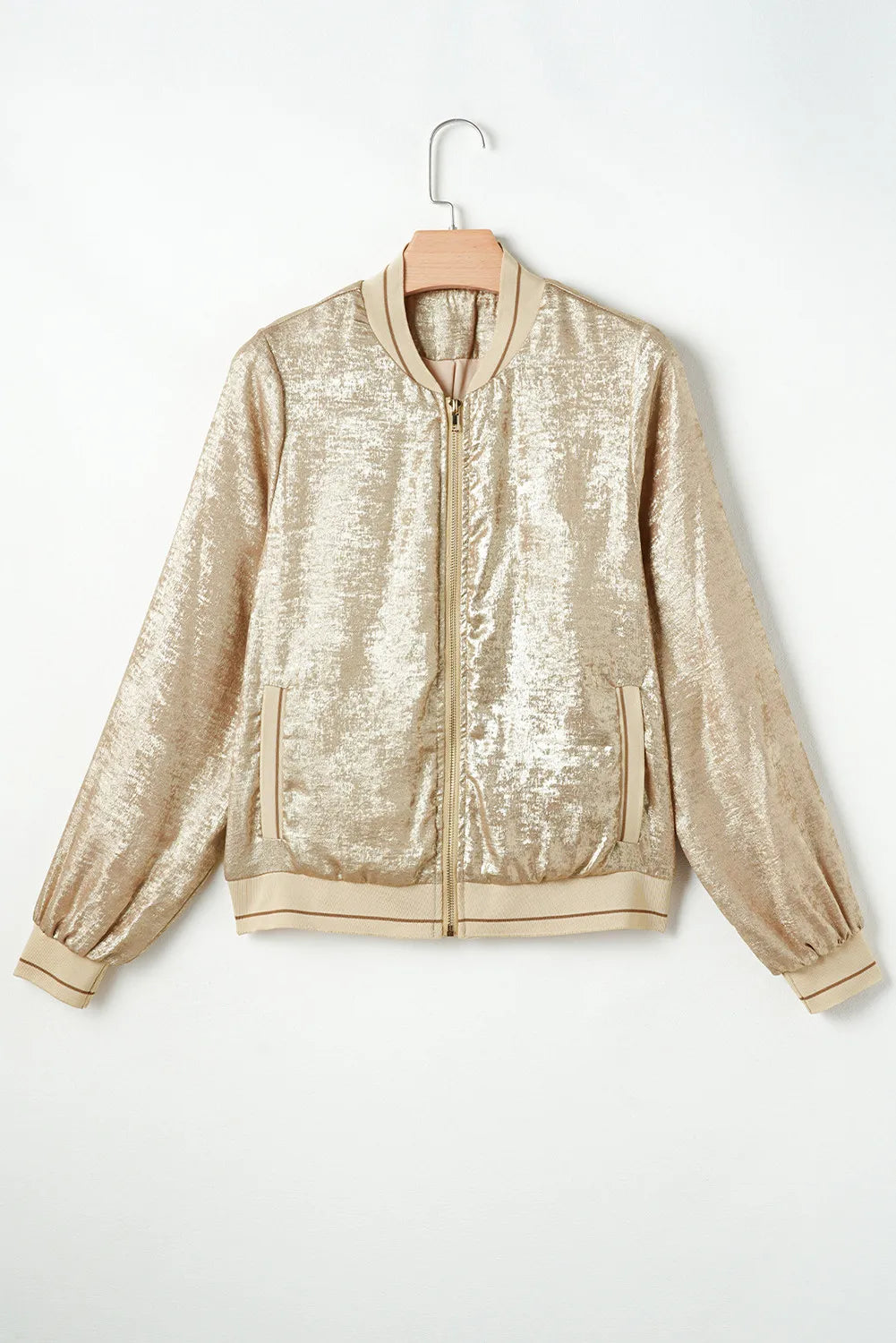 Metallic bomber jacket in tan with ribbed trim and zip front.