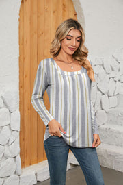 Long sleeve blouse with square neck and vertical stripe pattern in white, grey, and yellow.