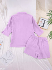 Lavender gauze cotton resort shirt and shorts set with buttoned collar and elastic waist shorts.