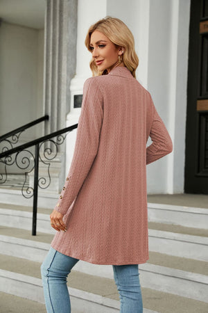 Dusty pink textured knit open-front duster cardigan with button detail on sleeves.