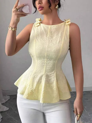 Yellow peplum tank top with floral texture and bow shoulder details