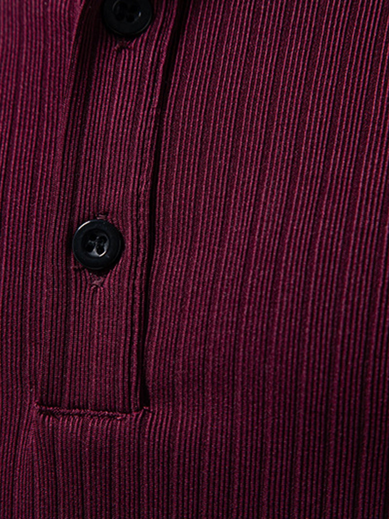Burgundy ribbed henley t-shirt with black buttons and visible stitching detail.