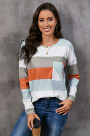 Ribbed stripe long sleeve top with patch pocket in multi-color stripes.