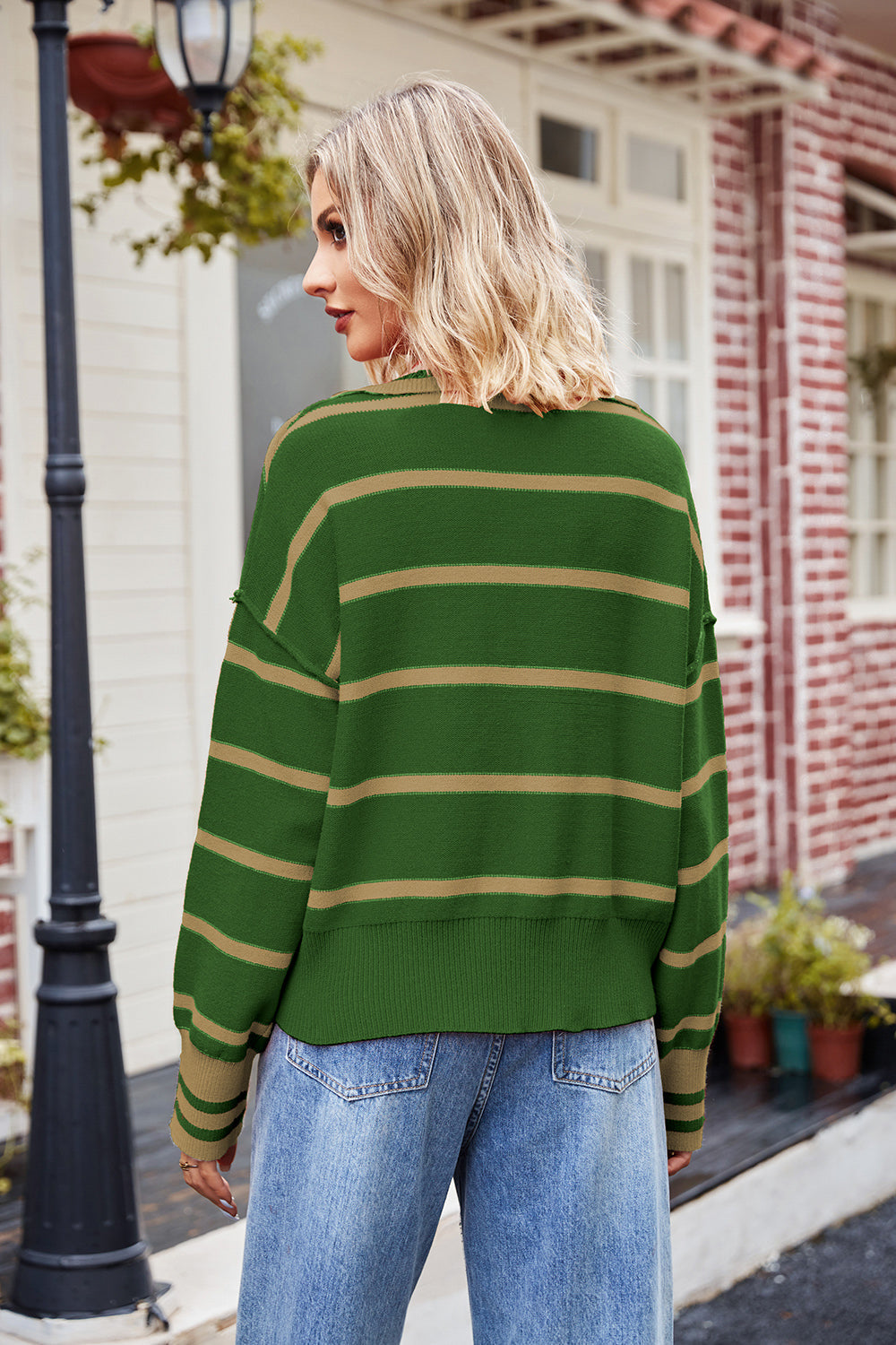 Striped polo collar knit sweater in green with tan stripes, acrylic material.