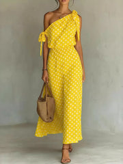 Yellow polka dot one-shoulder maxi dress with tie details and elastic waist