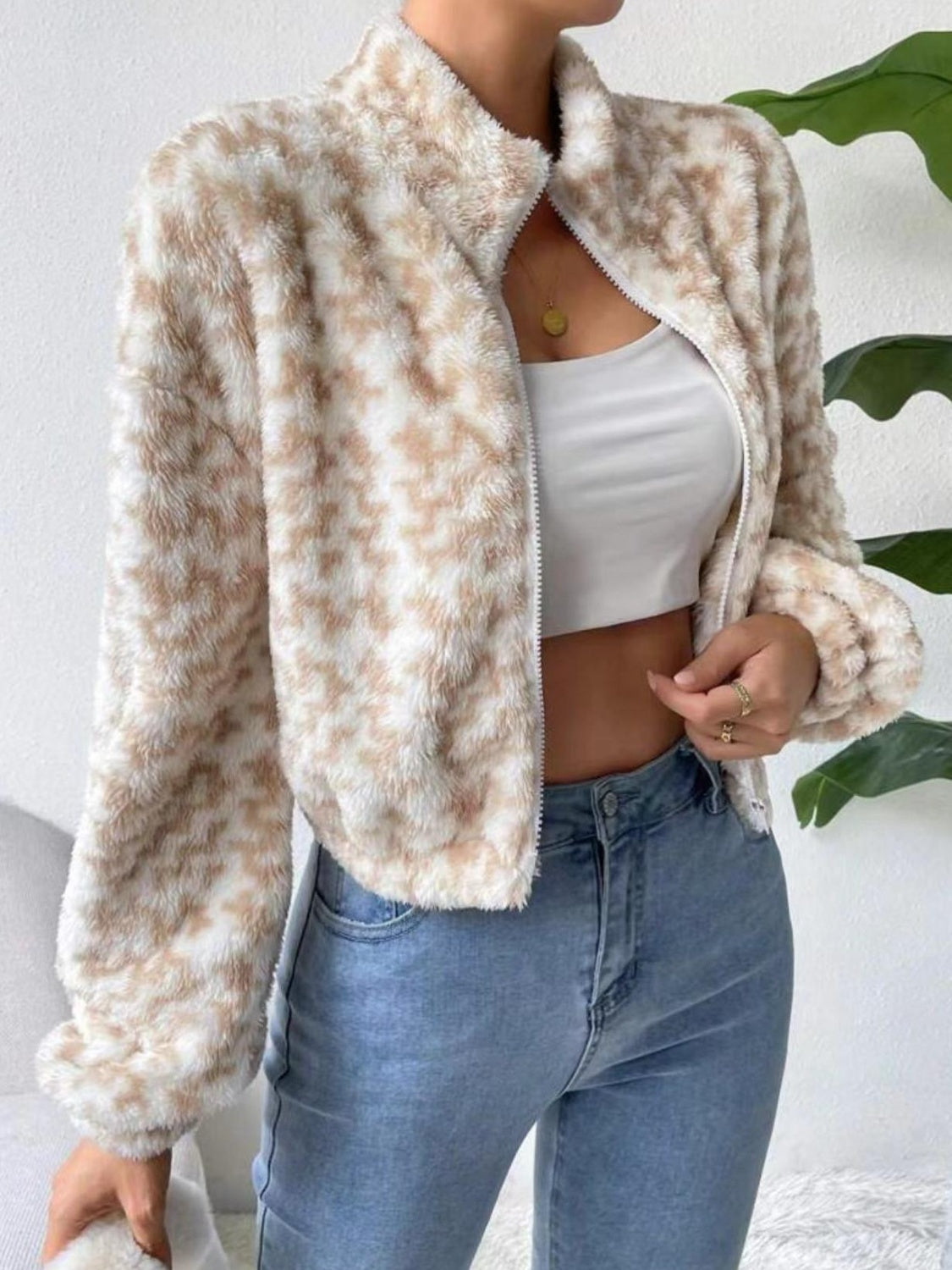 Textured geo-print fleece jacket in tan with balloon sleeves and a zip front.