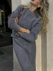 Dark gray textured knit co-ord set with relaxed fit sweater and pants.