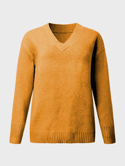 Ribbed trim V-neck knit sweater in mustard yellow with long sleeves and ribbed cuffs and hem.