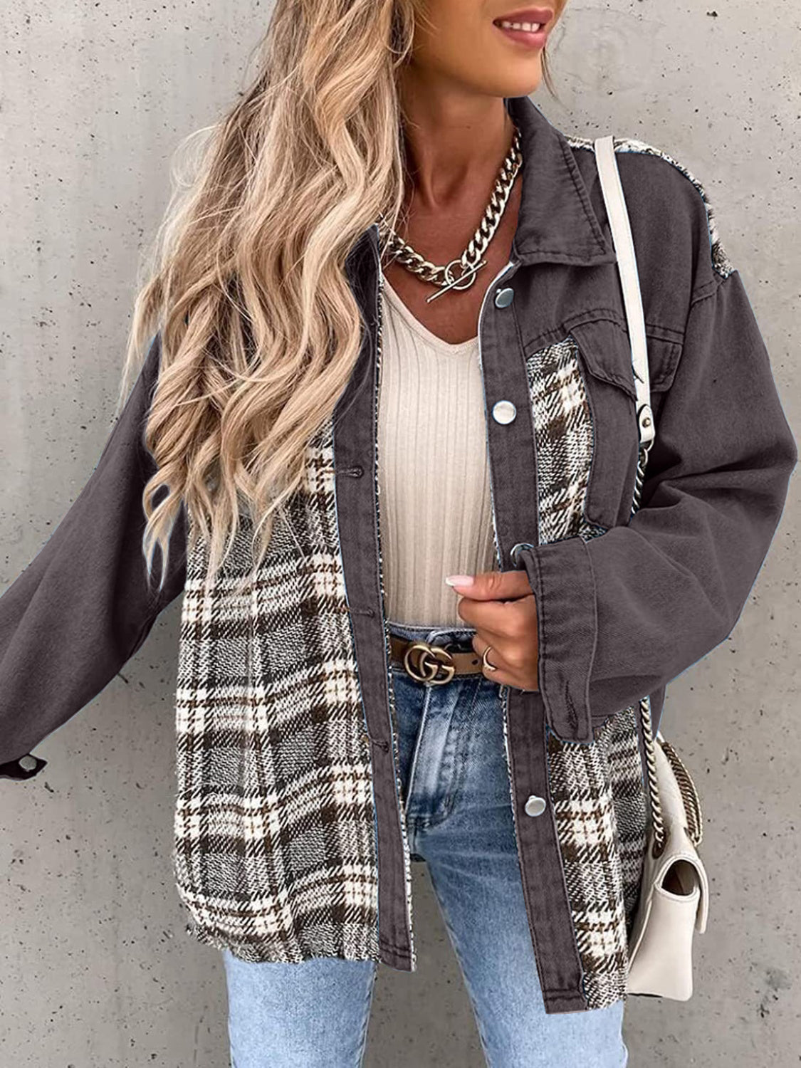 Panelled plaid denim hybrid jacket in dark gray with button closure and plaid inserts.