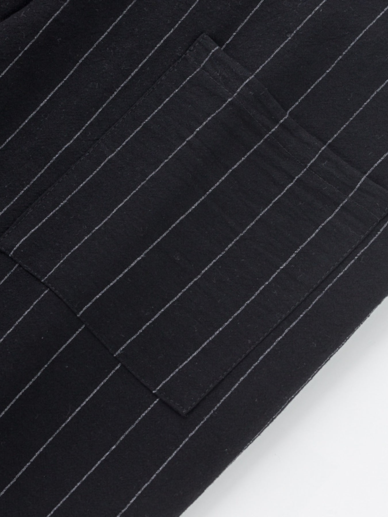 Black pinstripe sweatpants with wide legs and pocket detail.