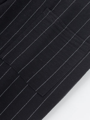 Black pinstripe sweatpants with wide legs and pocket detail.
