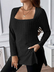 Black ribbed knit tunic with square neckline and side slits, styled with necklaces.