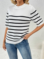 White and black striped knit top with button shoulder detail and short sleeves.