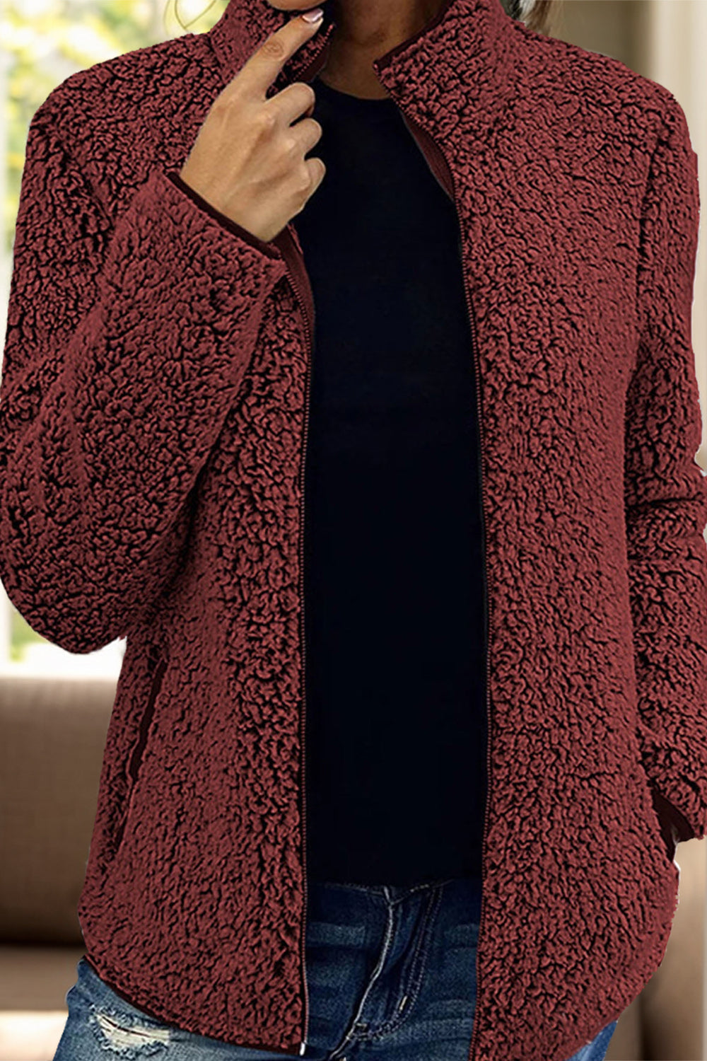 Burgundy teddy fleece zip-up jacket with a stand-up collar.