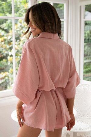 Dusty pink linen kimono sleeve romper with tie waist and collar detail