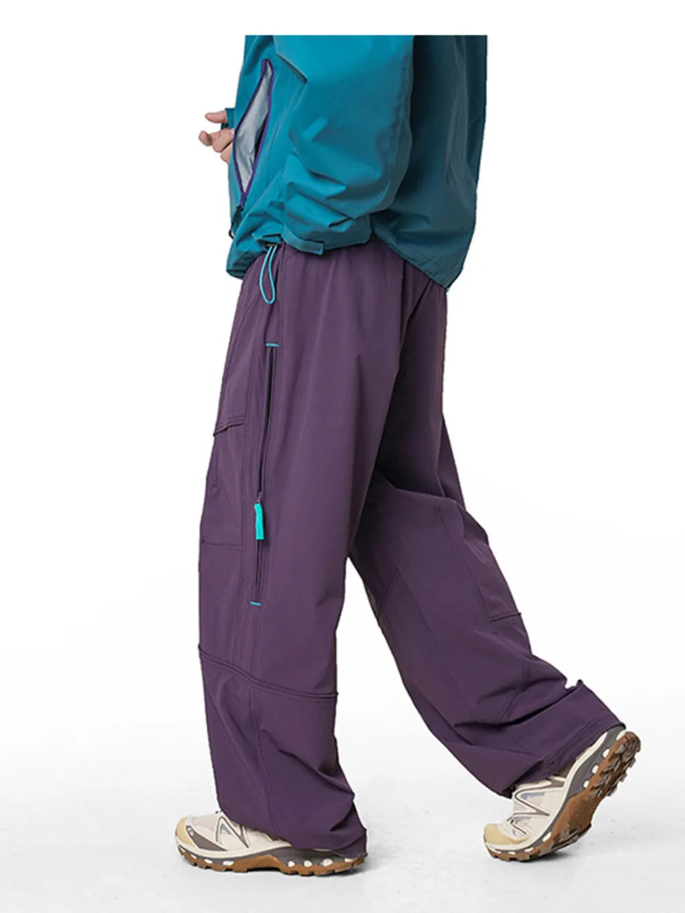 Relaxed Meadow Purple cargo active pants with drawstring and zip pockets.