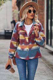 Southwestern print overshirt jacket in burgundy, blue, tan, and yellow with button front and chest pockets.