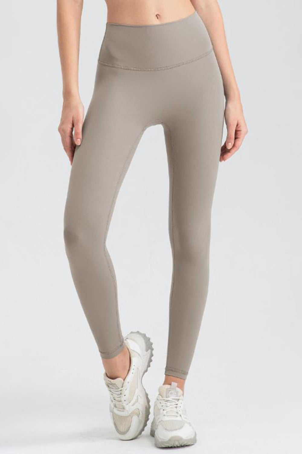 Women's high-waisted sculpted contour leggings in Khaki with a seamless waistband.