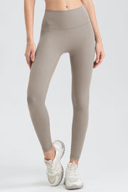Women's high-waisted sculpted contour leggings in Khaki with a seamless waistband.
