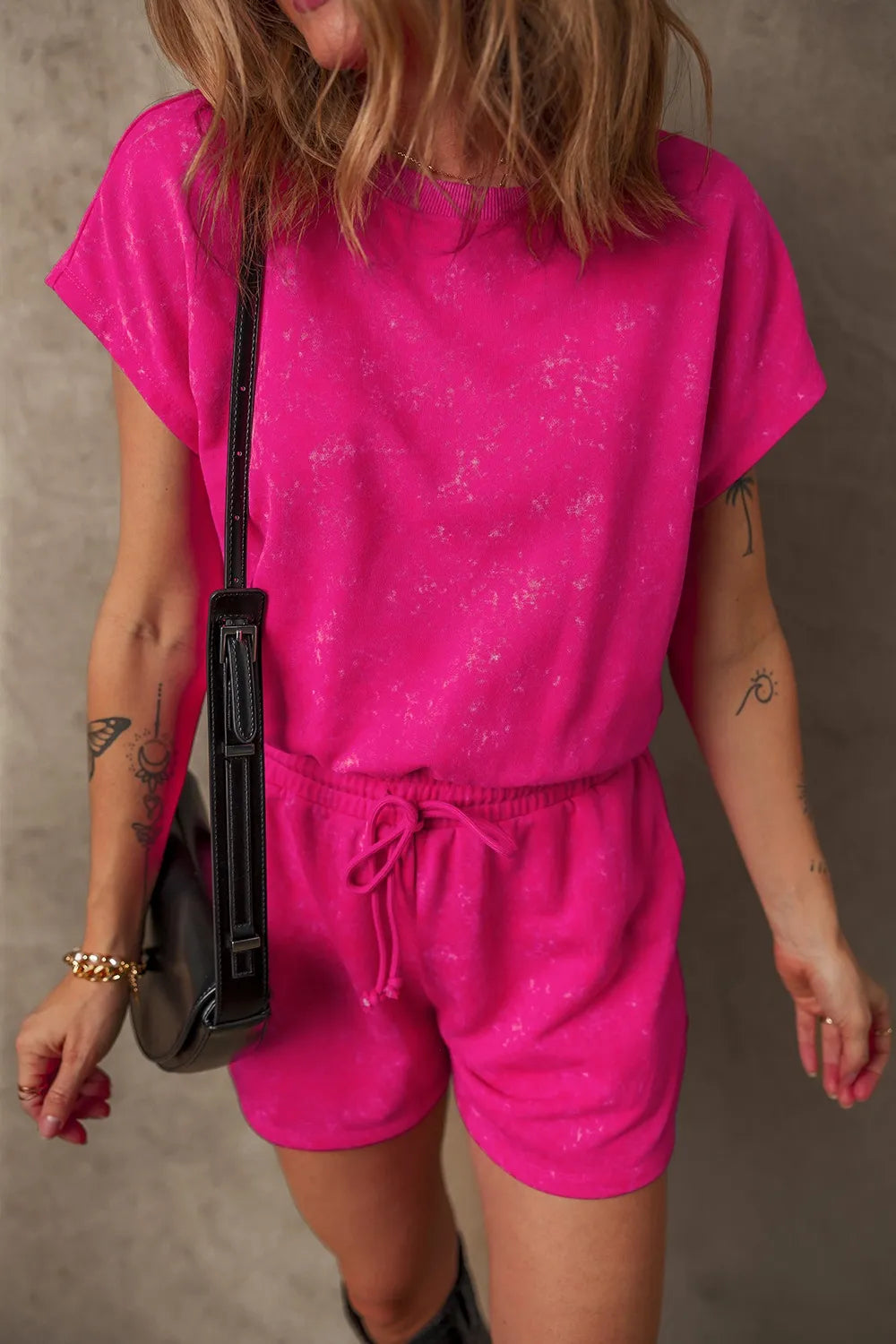 Hot pink acid wash tee and shorts set with drawstring waist.