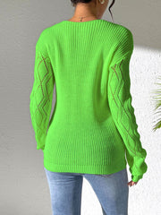 Lime green acrylic knit sweater with openwork diamond pattern on sleeves.