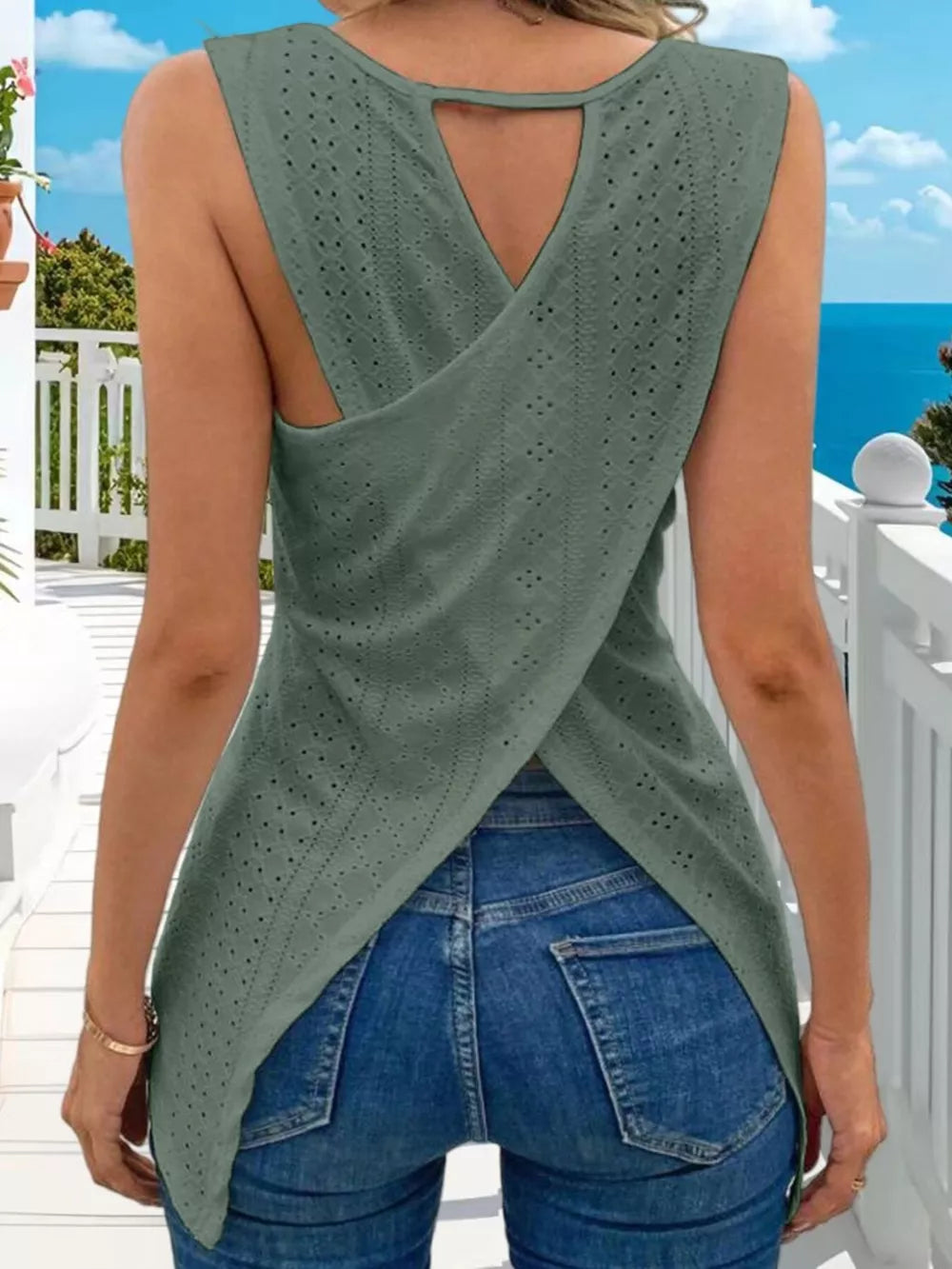 Army green openwork knit tank top with crisscross back detail and cutout.