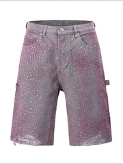 Crystal Burst Bermuda Shorts in pink wash denim with allover rhinestones and distressed hem.