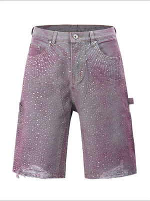 Crystal Burst Bermuda Shorts in pink wash denim with allover rhinestones and distressed hem.