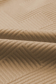 Tan textured polo set fabric with wide-leg culotte detail