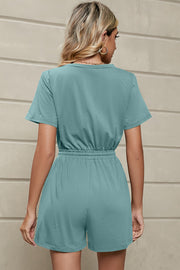 Teal casual romper with short sleeves, elastic waist, and shorts.