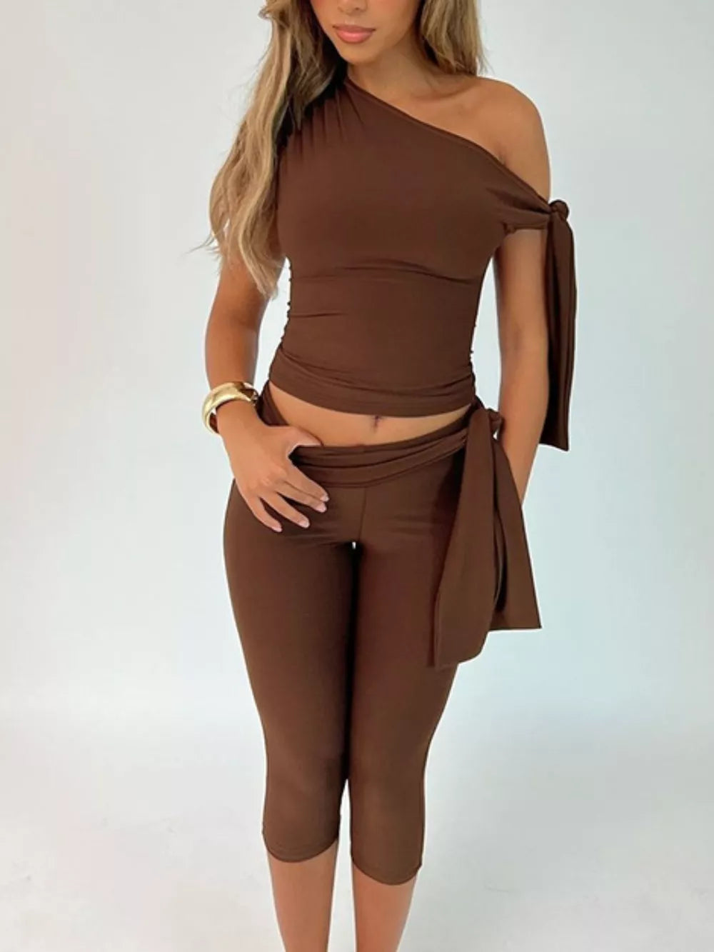 Brown one-shoulder tie top and capri set with a wrap detail.