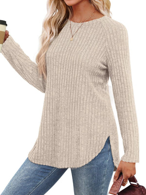 Taupe ribbed knit sweater with raglan sleeves and asymmetric hem detail.