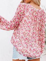 Maternity floral print long sleeve shirt with V-neck and gathered detail in pink.