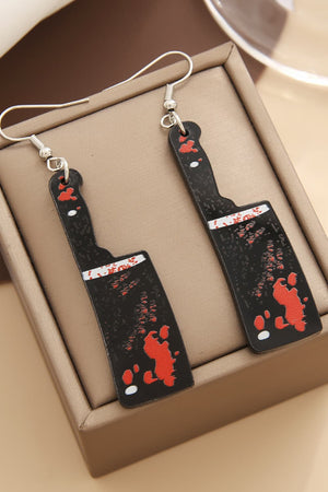 Gory blade drop earrings in black with red splatter detail and silver hooks.