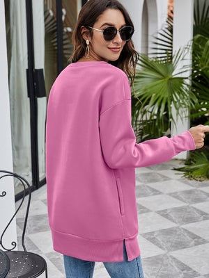 Dusty Pink extended hemline sweatshirt with side pocket detail and crew neck.