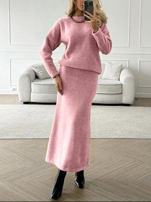 Textured knit co-ord set in blush pink, featuring a relaxed fit sweater and maxi skirt.