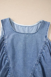 V-neck pleated denim sleeveless top with a casual cut.
